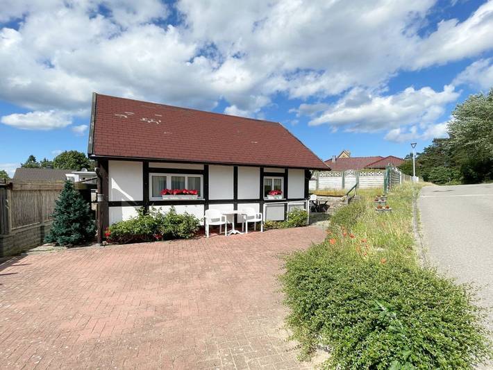 Ferienhaus für 2 Personen, mit Terrasse und Garten sowie Seeblick in Loddin