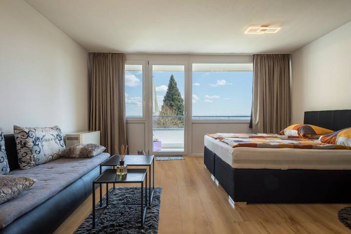 Ferienwohnung für 4 Personen, mit Balkon und Garten sowie Seeblick am Bodensee - 2