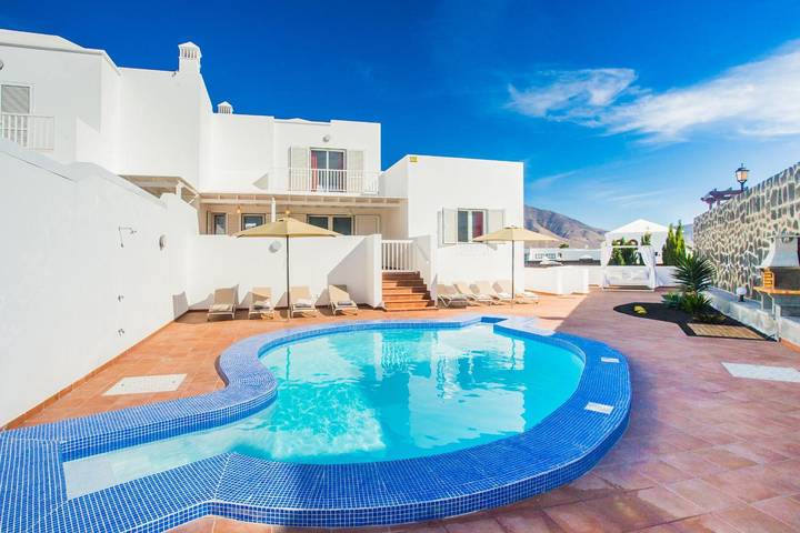 Casa de vacaciones para 8 personas, con balcón y jardín en Yaiza