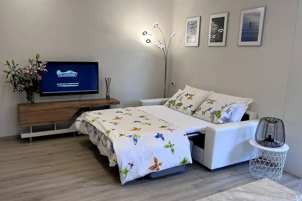 Ganze Wohnung, Bright and quiet apartment with garden, pets allowed. in Ponti sul Mincio, Gardasee-Berge