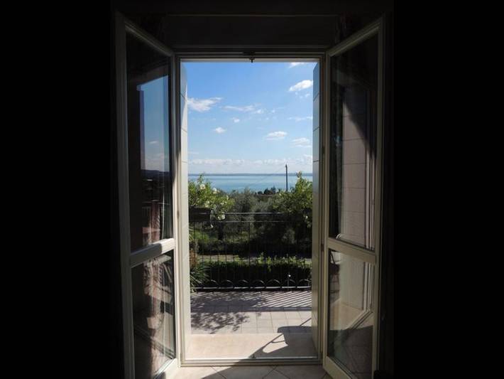 Ferienwohnung für 4 Personen, mit Seeblick und Balkon sowie Garten in Moniga del Garda