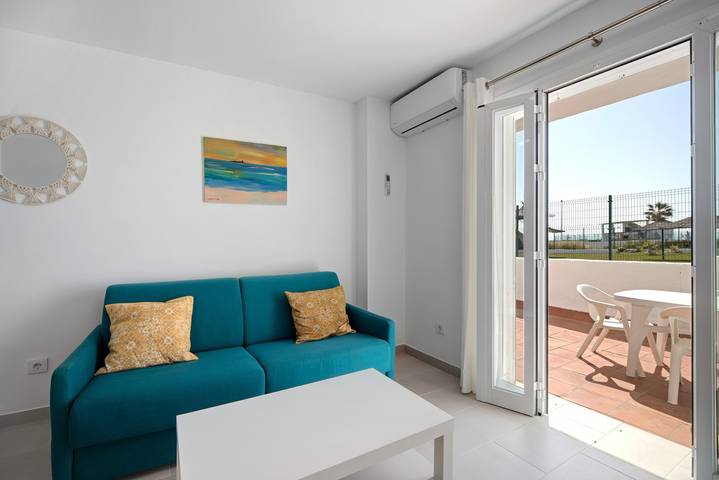 Apartamento entero, Bajo con terraza en primera linea de playa in La Barrosa, Chiclana de la Frontera