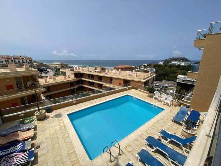 Casa de férias para 4 pessoas, com piscina e vista e ainda varanda em Praia da Areia Branca