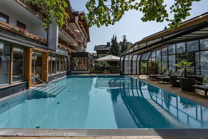 Ferienwohnung für 4 Personen, mit Pool und Sauna sowie Ausblick und Garten, kinderfreundlich