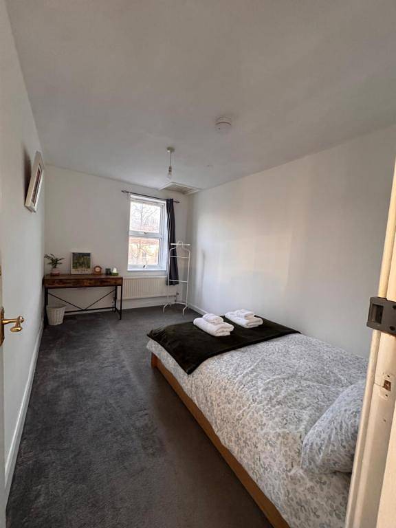 Kamer voor 3 personen in Merton, Londen