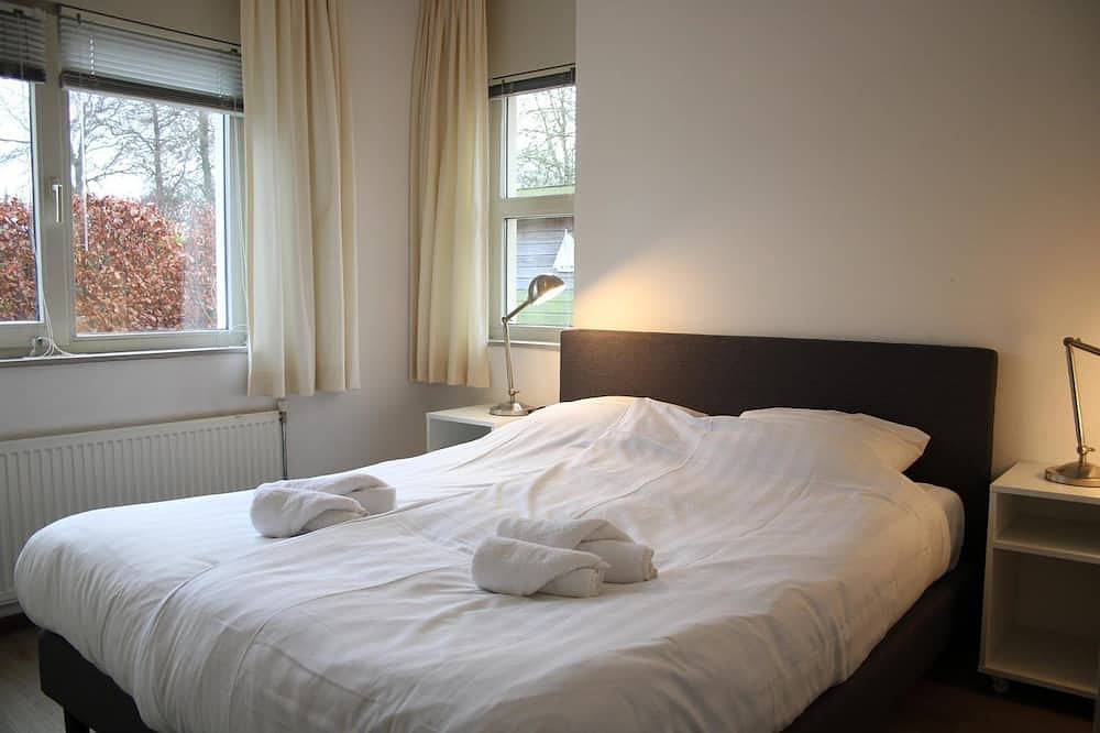 Gezellig, modern ingericht vakantiehuis met fijn terras en een aanlegsteiger in IJsselmeer