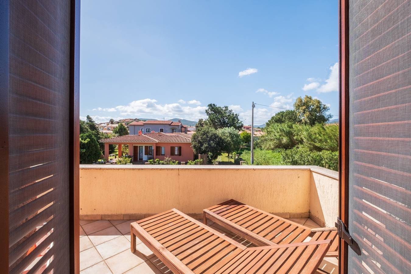 Ginepro: a quiet and cozy apartment with Air Conditioning and all comforts in Suaredda-traversa, San Teodoro