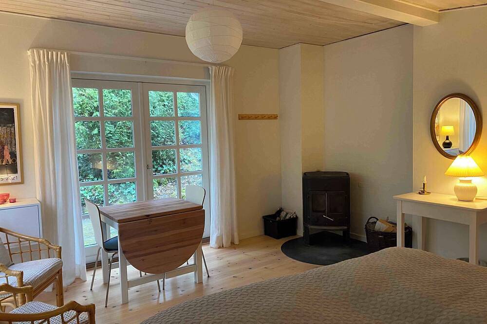 Idyllically situated wooden house by the forest in Viborg