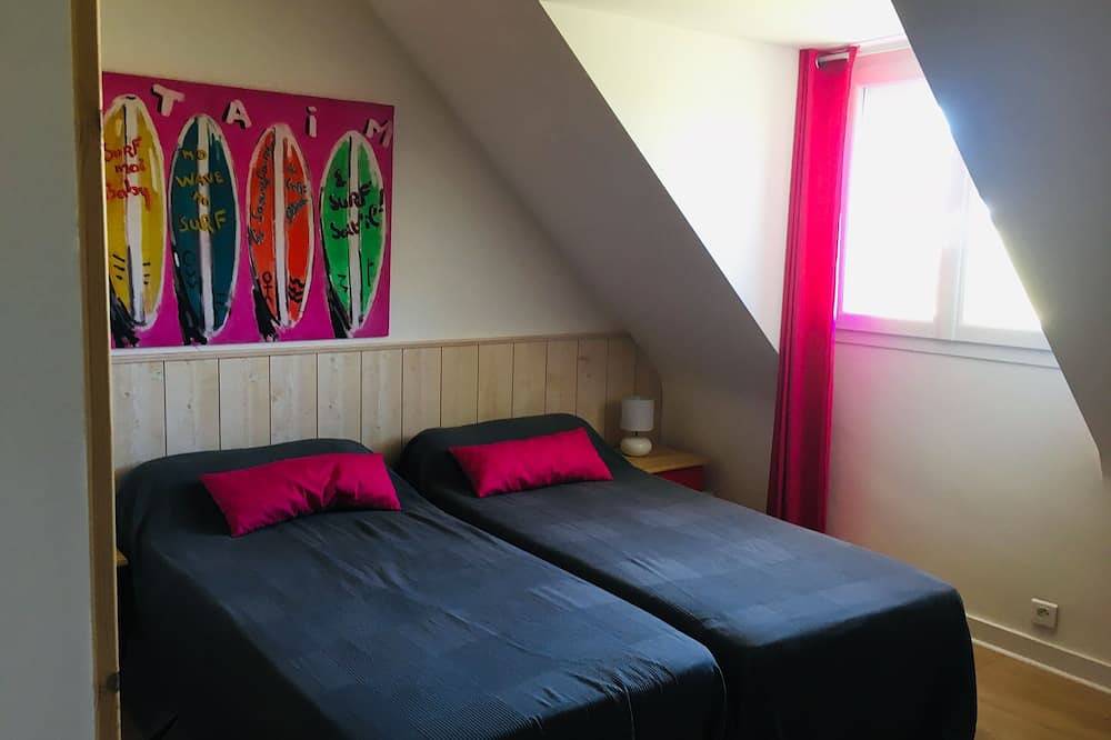 Breton house by the ocean in the dunes of Trez Goarem in Esquibien, Audierne
