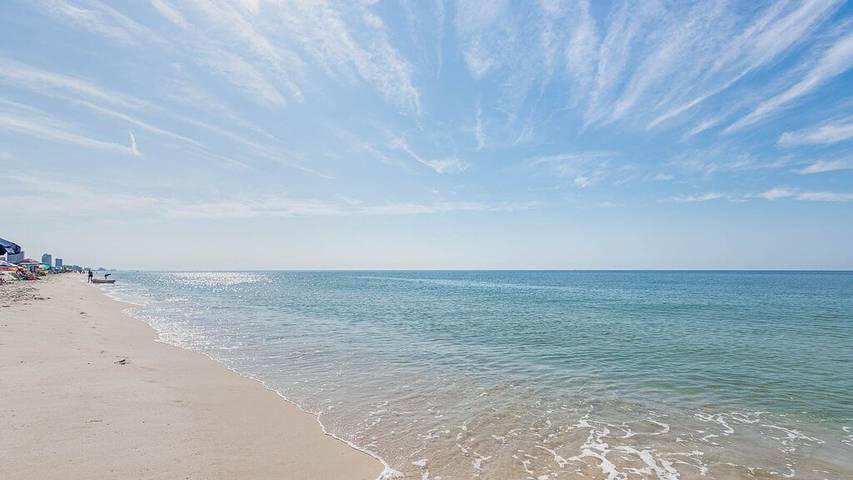 Vacation rental for 4 people, with sauna and hot tub as well as pool and balcony by Orange Beach