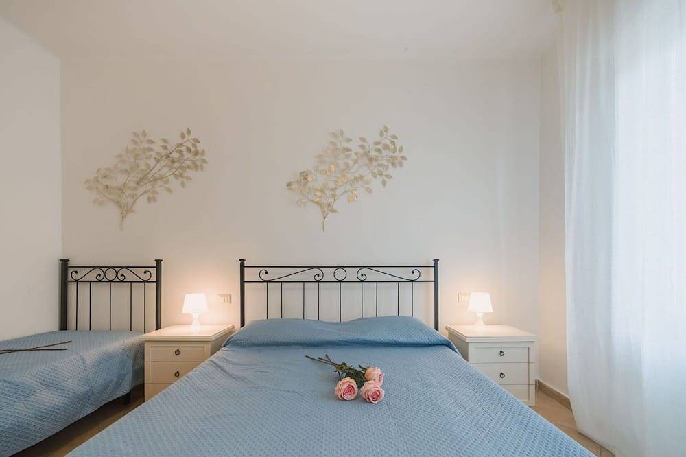 Appartamento intero, Elegante appartamento per 5 ospiti con Wifi, Tv e patio in Lido di Camaiore, Riviera Toscana