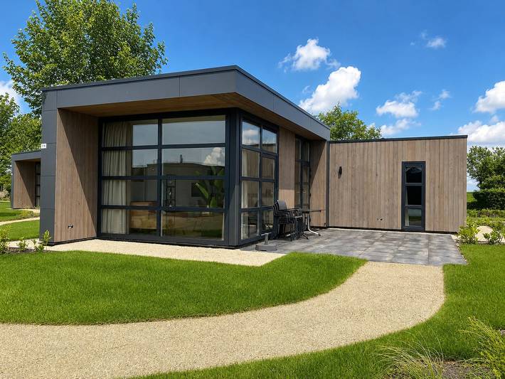 Ferienhaus für 4 Personen, mit Balkon/Terrasse und Terrasse sowie Garten