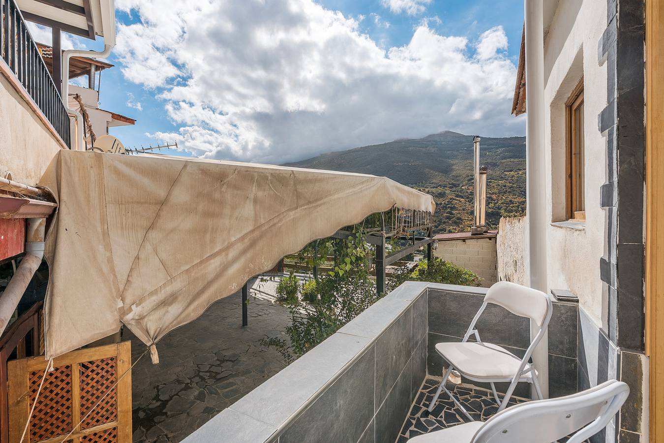 Apartamento entero, Apartamento 'Veleta' con vistas a la montaña, Wi-Fi y aire acondicionado in Entorno de Sierra Nevada, Güejar Sierra