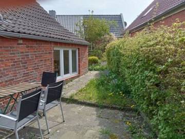 Ferienhaus für 4 Personen, mit Terrasse und Garten in Rysum