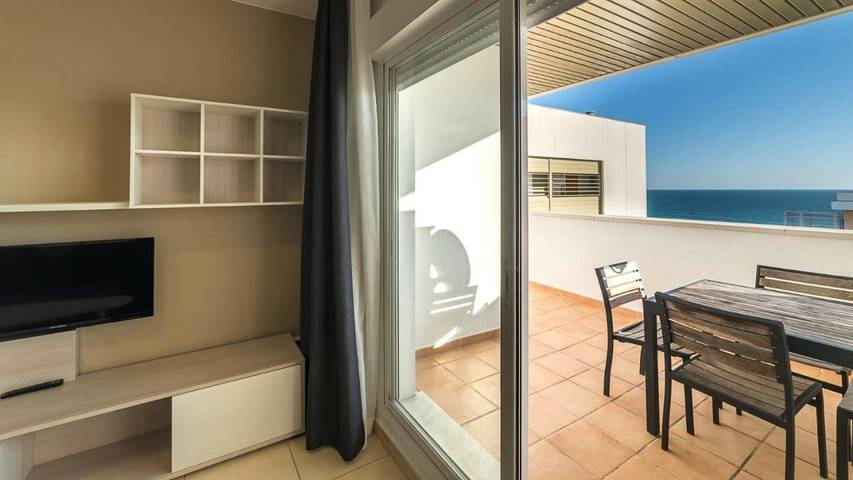 Apartamento para 3 personas, con jardín y piscina en Punta Umbría