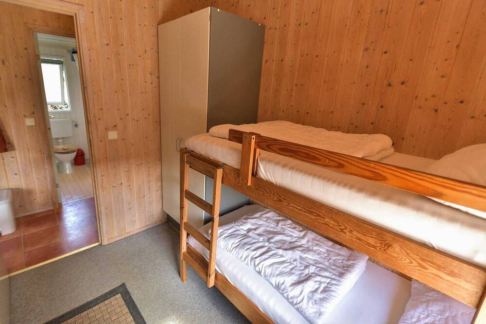 Ferienhaus Typ A mit Doppel-/Etagenbett für 4 Personen im Ferienpark Am Waldrand in Südstrand Pelzerhaken, Ostholstein