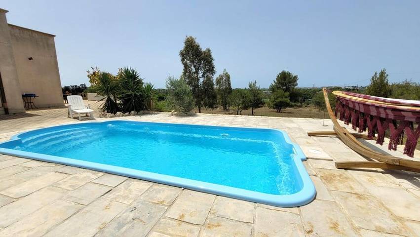Casa sulla spiaggia per 6 persone, con panorama e giardino nonché piscina in Salento