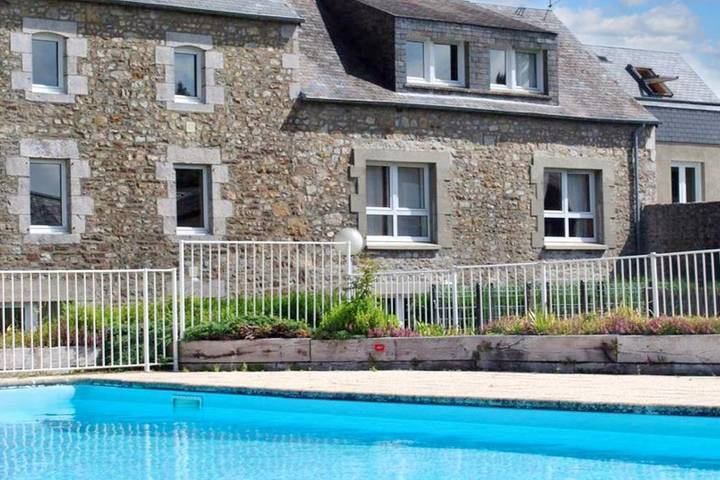 Appartement de vacances pour 5 personnes, avec jardin ainsi que piscine et balcon