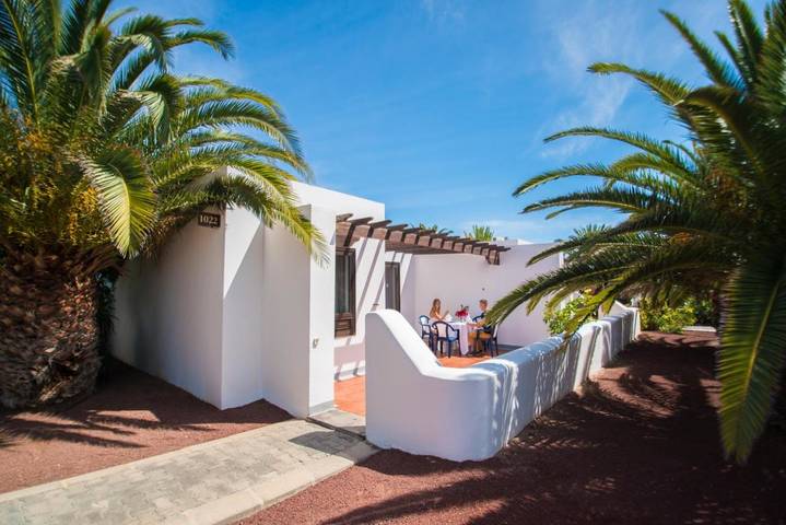 Hôtel pour 4 personnes, avec jardin et piscine ainsi que bassin pour enfant et vue