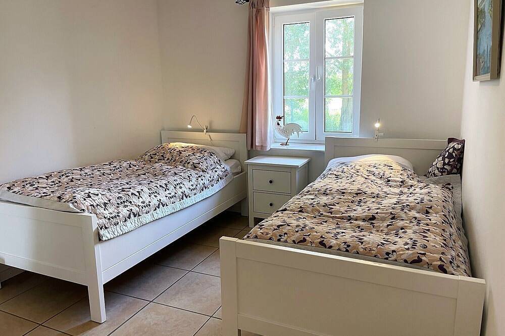 Ferienhaus Marie - barrierearm, mit Hundewaschraum, 1.20m hoch eingezäunt, Kamin in Rodenäs, Nordfriesland