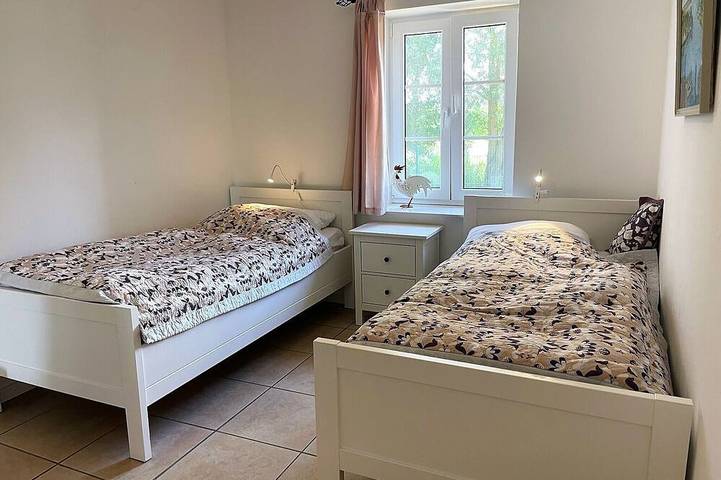 Ferienhaus Marie - barrierearm, mit Hundewaschraum, 1.20m hoch eingezäunt, Kamin in Rodenäs, Nordfriesland
