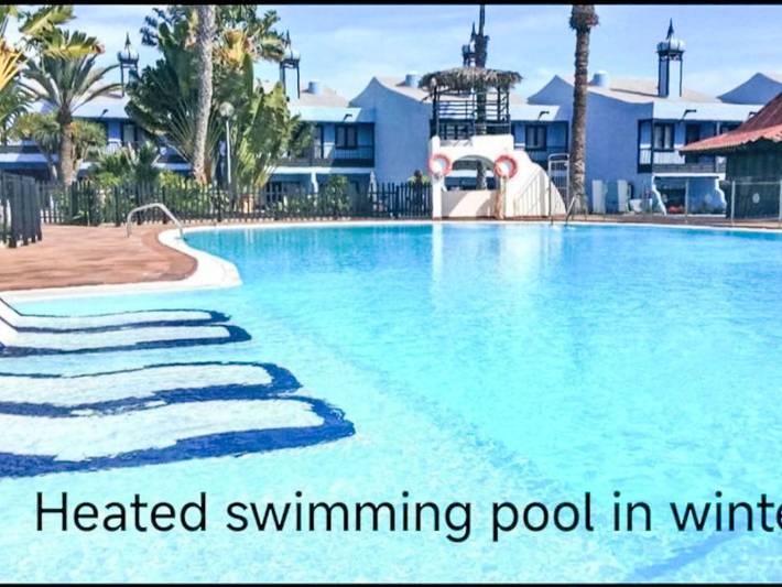 Ferienwohnung für 3 Personen, mit Terrasse und Pool sowie Garten, mit Haustier in Playa del Águila