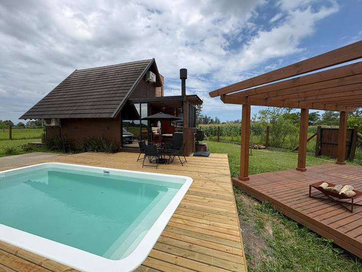 Casas e apartamentos de temporada para 2 pessoas, com jacuzzi e balcão e ainda piscina and jardim em Araranguá