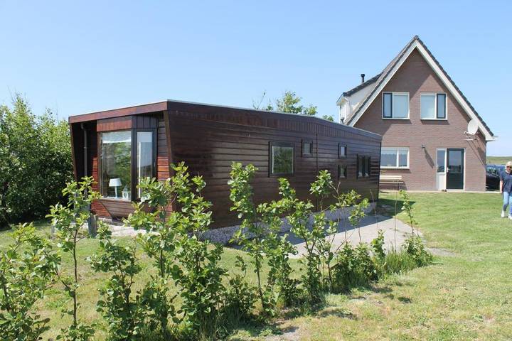 Chalet für 4 Personen, mit Terrasse und Garten sowie Ausblick in Den Helder
