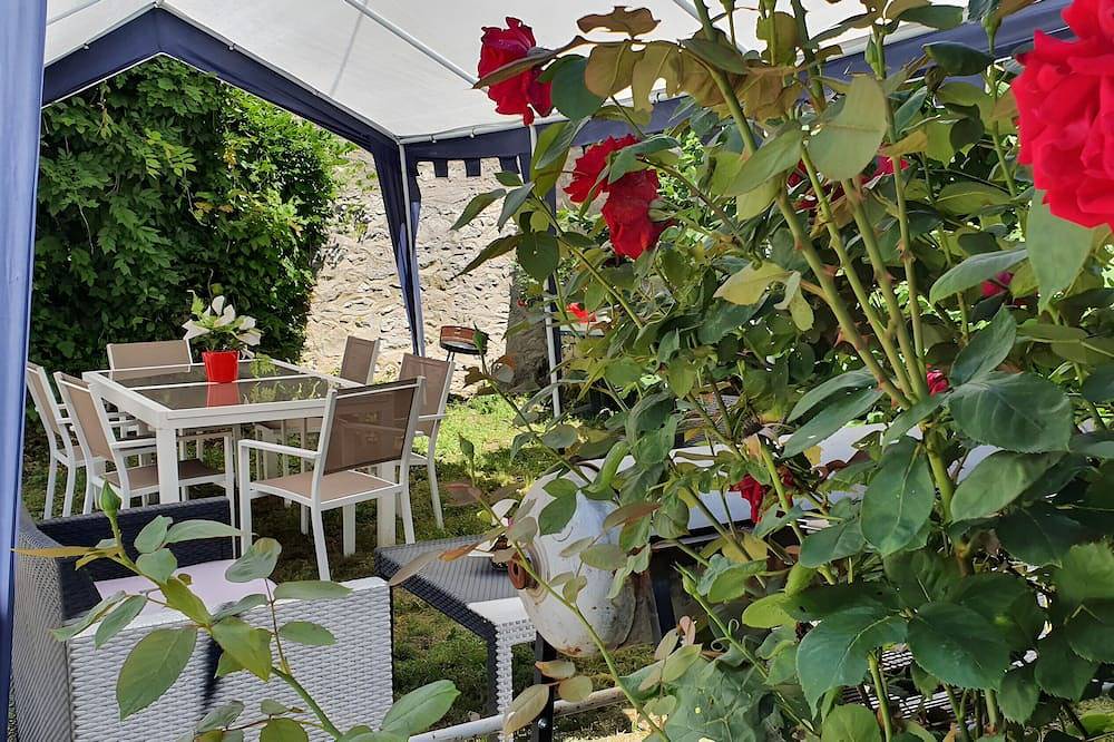 Casa de huéspedes 'Chambre Cheverny - Le Petit Puits' con jardín común y Wi-Fi in Cour-Cheverny, Sologne