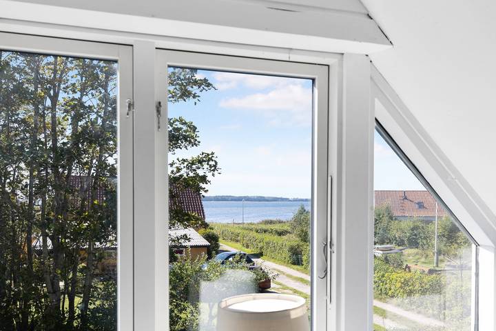 Ferienhaus für 8 Personen, mit Terrasse und Garten sowie Seeblick in Orø