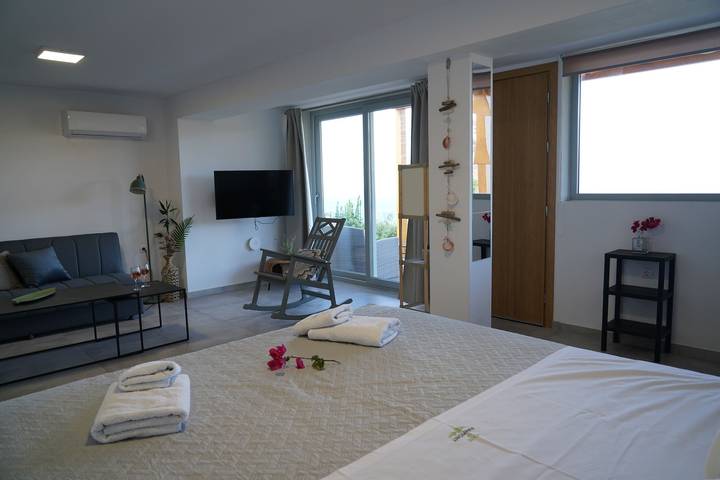 Appartement de vacances pour 3 personnes, avec jardin ainsi que balcon et vue sur l’océan