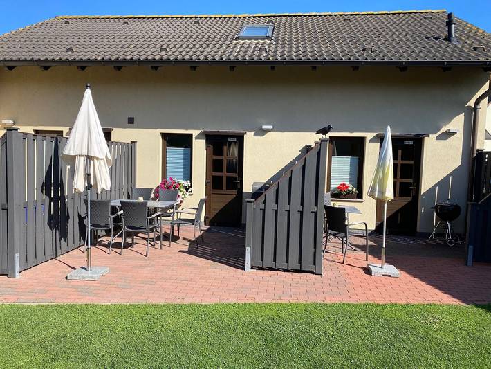 Ferienwohnung für 2 Personen, mit Terrasse und Garten sowie Ausblick in Juliusruh, Rügen