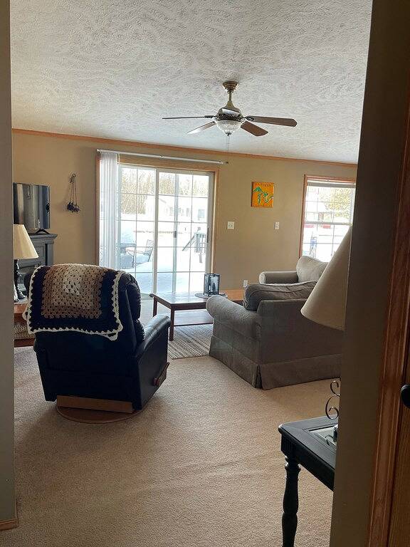 Beautiful Canal Front Houghton Lake 3/2. Close to trails. Golf cart use in sub in Prudenville, Roscommon County