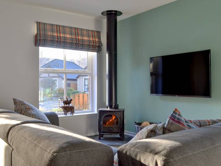 Log cabin for 4 people, with garden in Aviemore