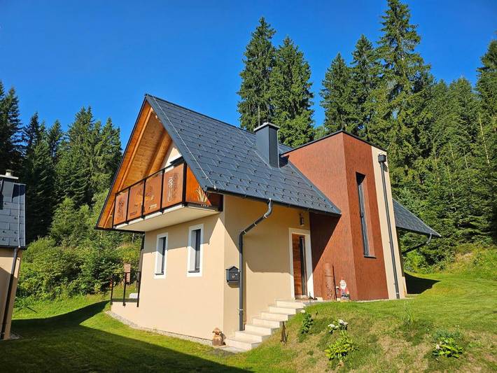 Ferienhaus für 8 Personen, mit Balkon und Terrasse sowie Garten und Ausblick