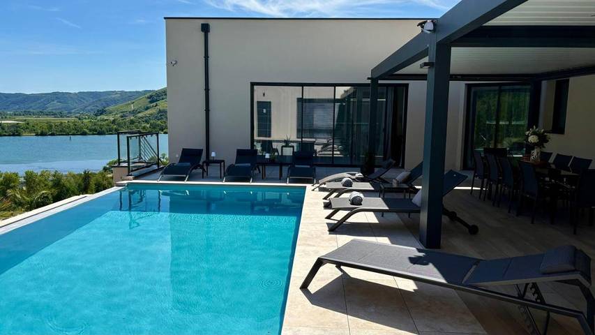 Appartement de vacances pour 4 personnes, avec Terrasse ainsi que Piscine et Vue