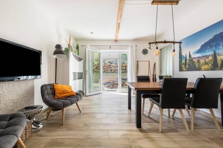 Location de vacances pour 5 personnes, avec jardin à Costermano