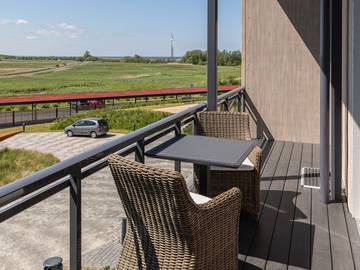 Ferienwohnung für 3 Personen, mit Balkon und Seeblick in Wustrow