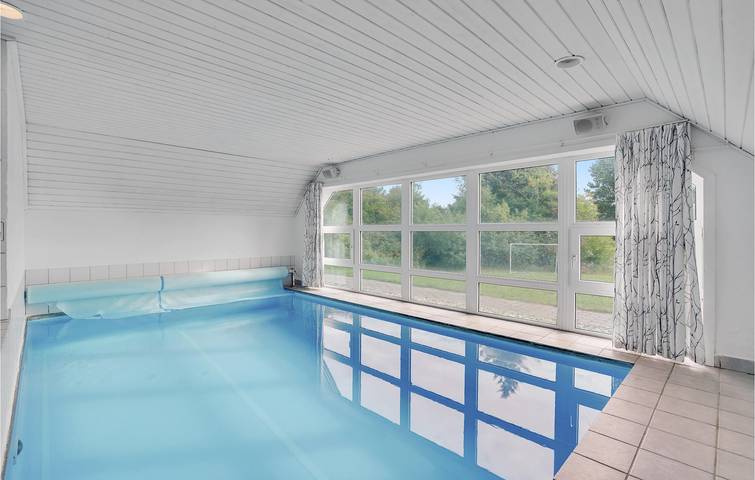 Ferienhaus für 10 Personen mit Terrasse in Sønderstrand, Tagholm
