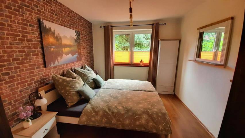 Ferienwohnung für 5 Personen, mit Balkon und Terrasse sowie Garten