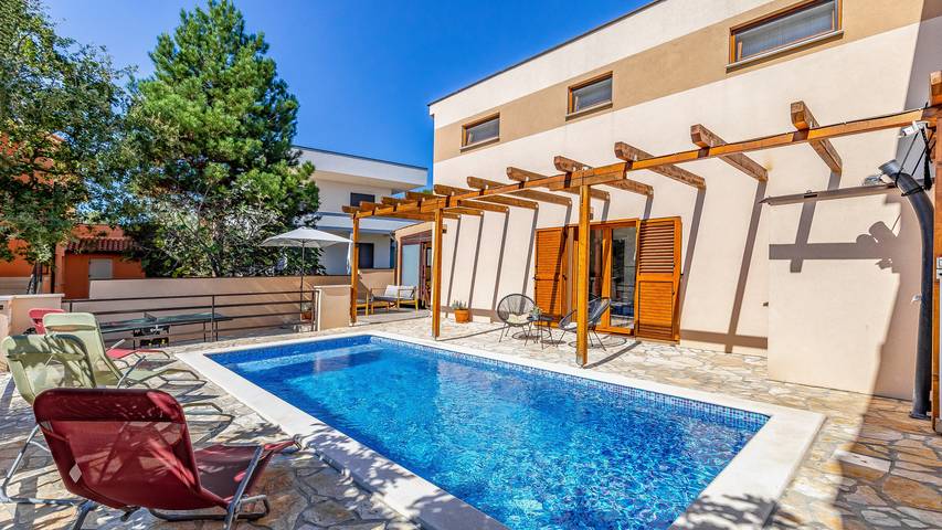 Villa pour 6 personnes, avec jacuzzi et terrasse ainsi que jardin et sauna à Barbariga