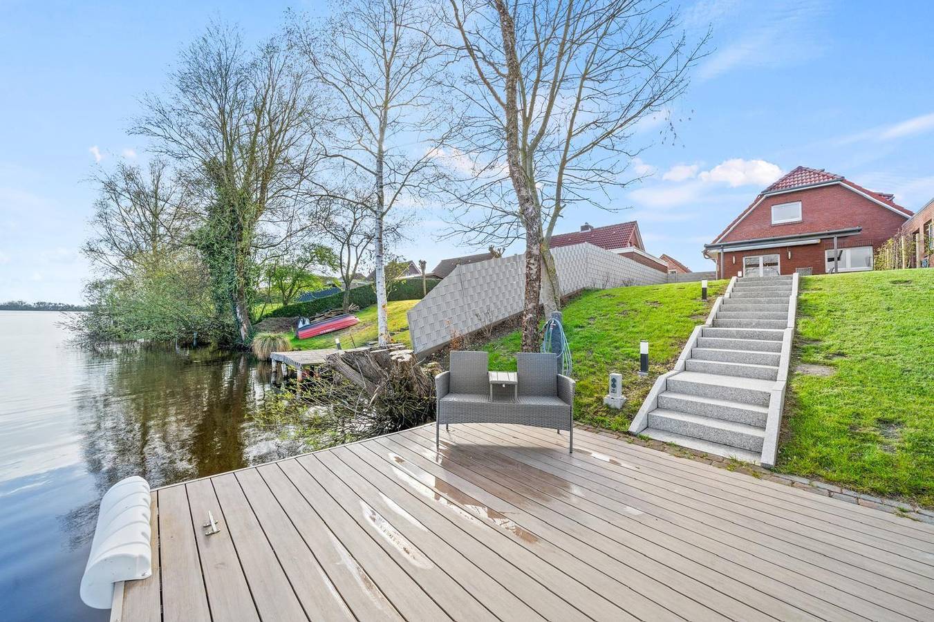 Ferienhaus "Meerlounge" am Wasser mit Steg in Großefehn, Landkreis Aurich