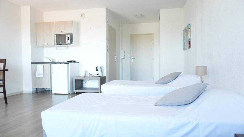 Appart’hôtel pour 4 personnes, avec Balcon ainsi que Terrasse et Jardin à Yzeure