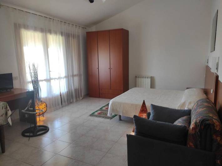 Ferienwohnung für 4 Personen, mit Terrasse und Garten sowie Seeblick und Ausblick