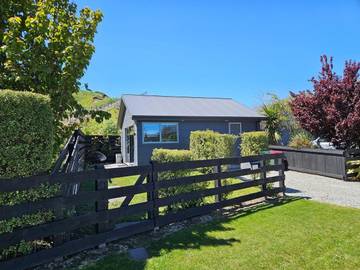 Gîte pour 2 personnes, avec terrasse ainsi que jardin et vue à Queenstown
