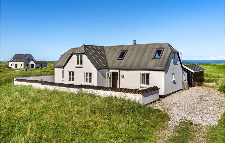 Ferieudlejning for 6 personer, med Terrasse og Jacuzzi såvel som Have og Sauna i Lild Strand