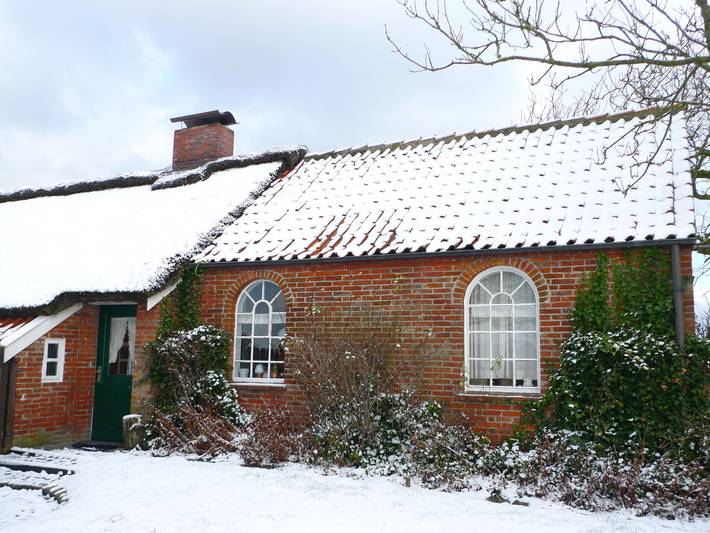 Ferienhaus für 2 Personen, mit Ausblick und Garten sowie Terrasse, mit Haustier in Norddeich