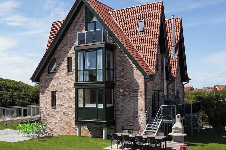 Ferienhaus für 9 Personen, mit Balkon und Garten