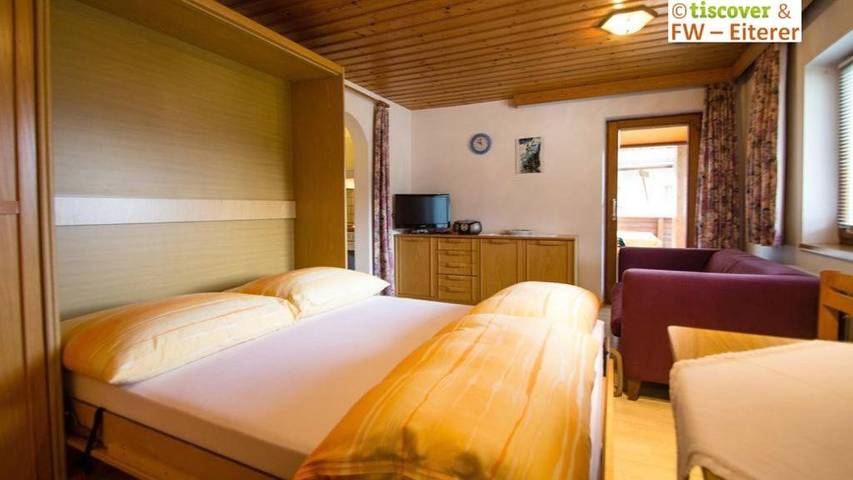 Ferienwohnung für 3 Personen, mit Balkon und Terrasse sowie Garten und Ausblick in Faggen