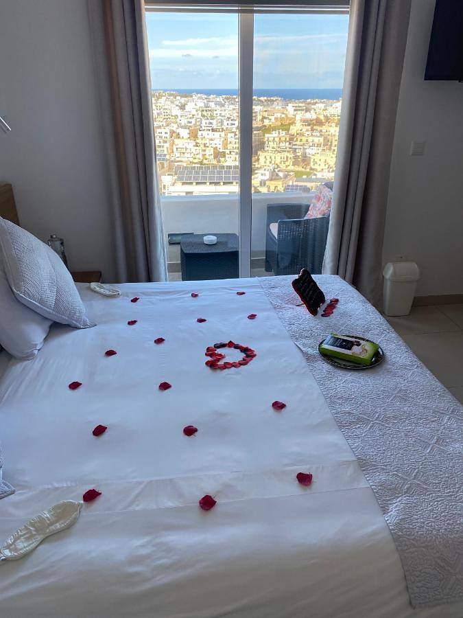 Alojamiento y desayuno para 3 personas, con balcón en Malta